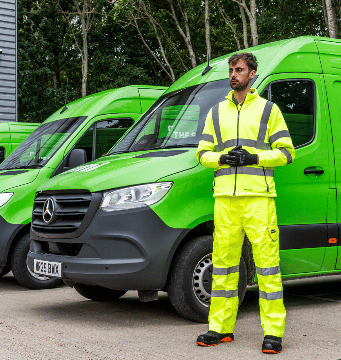 Man wearing yellow hi-vis ppe.