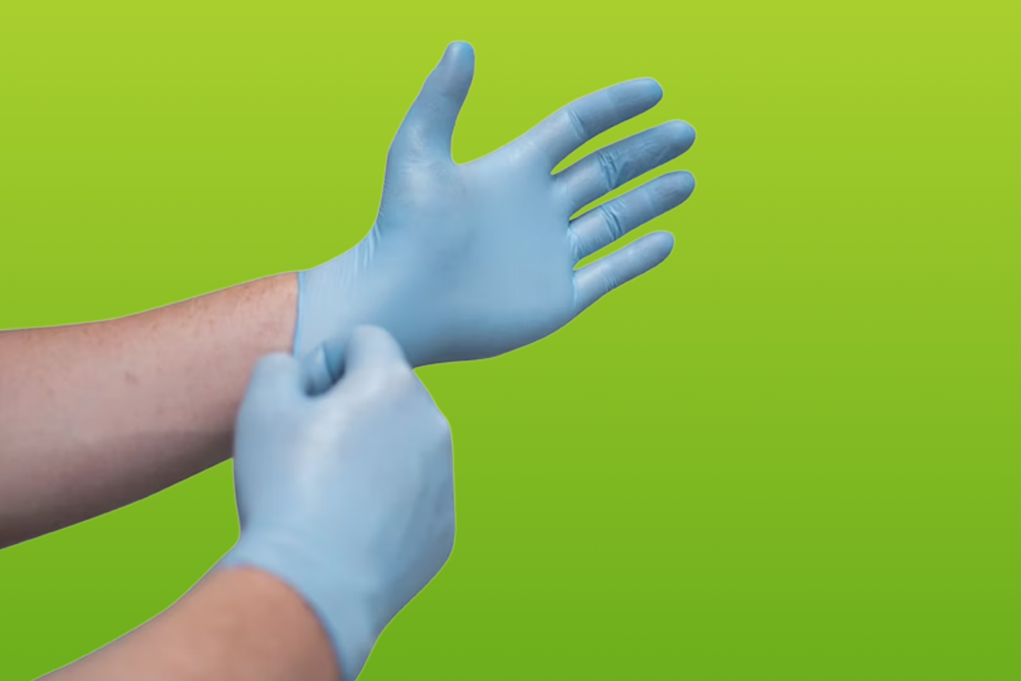 Blue disposable gloves on hands.