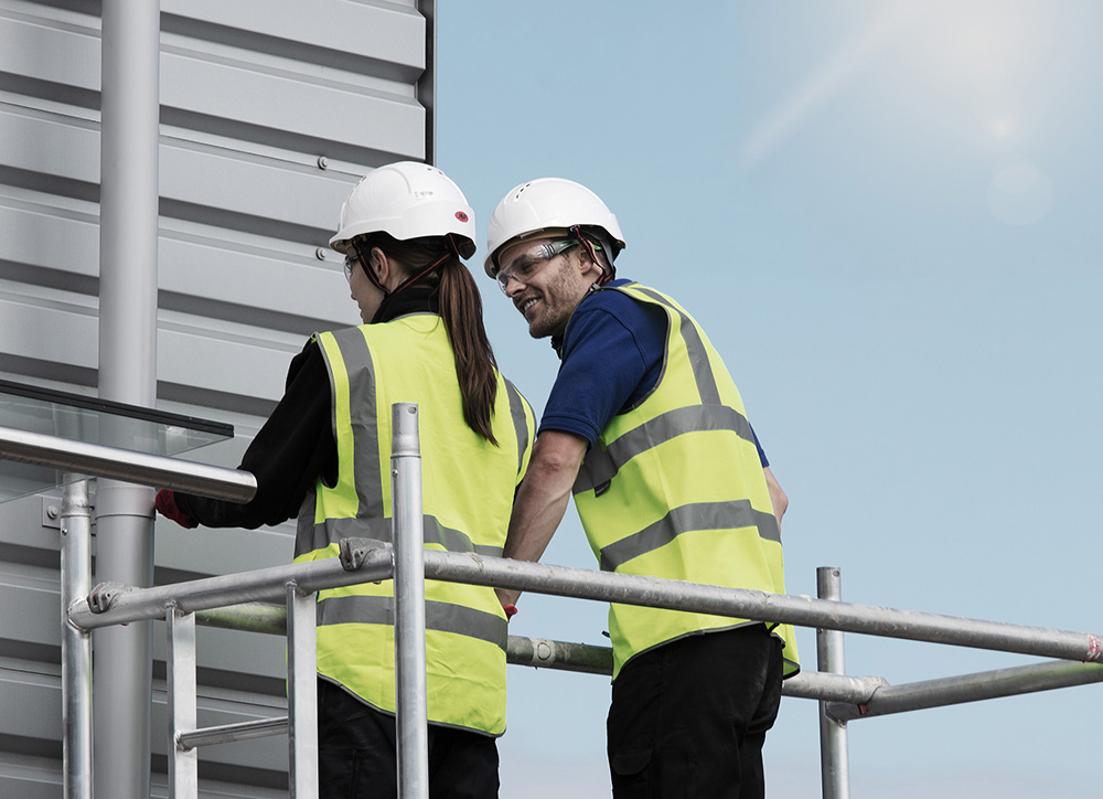 Facilities workers in the sun