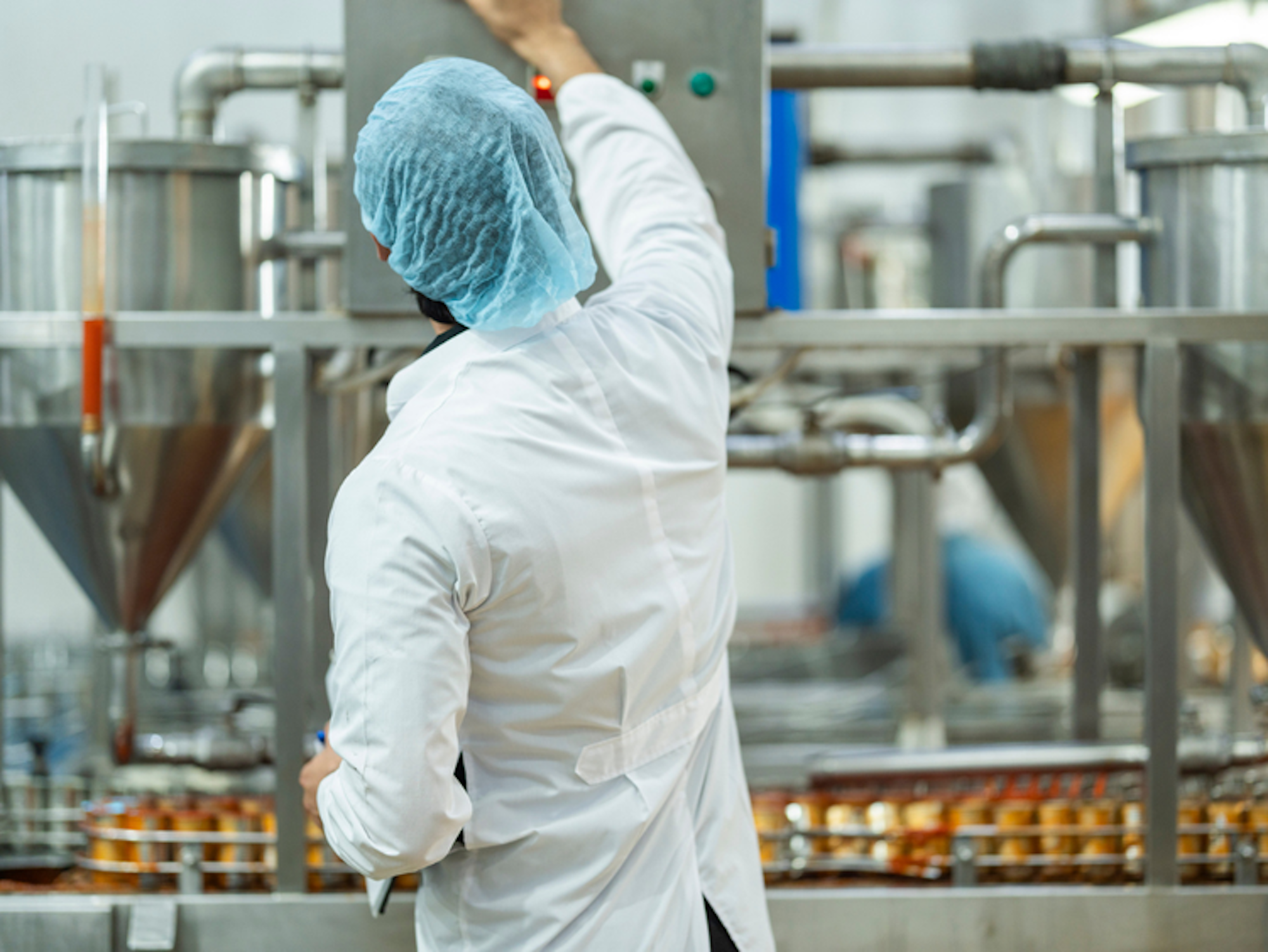 Man wearing food hygiene safe PPE
