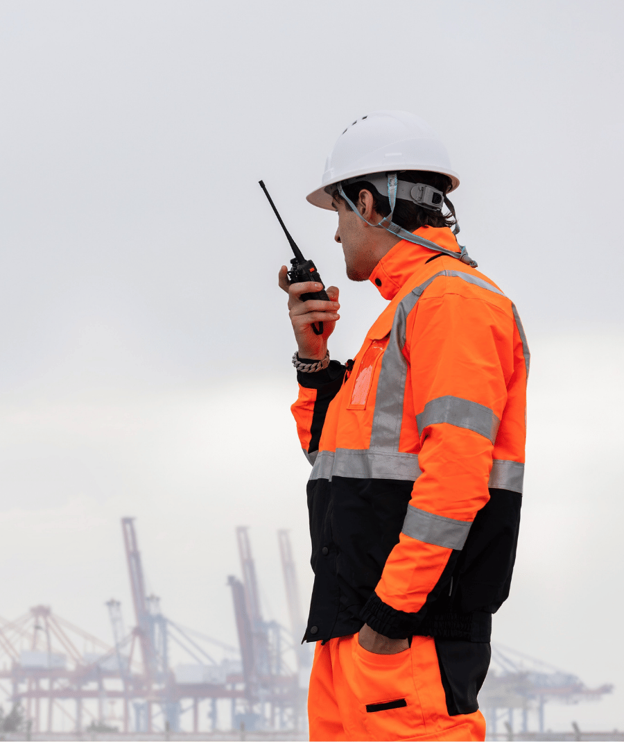 Freight worker in hi-vis workwear.