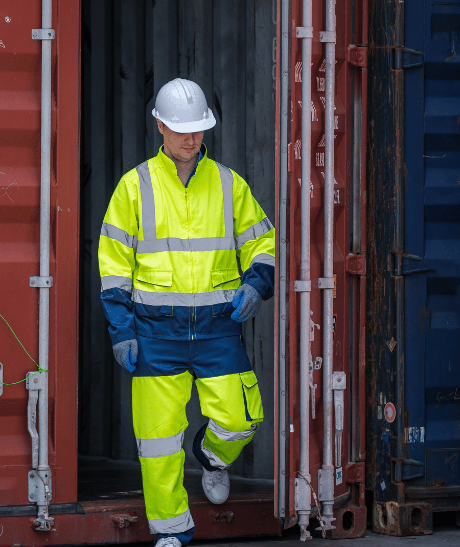 Freight worker in hi-vis workwear.