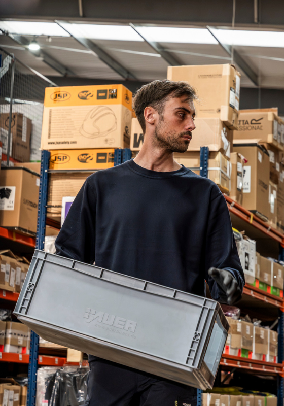 Man in workwear and PPE