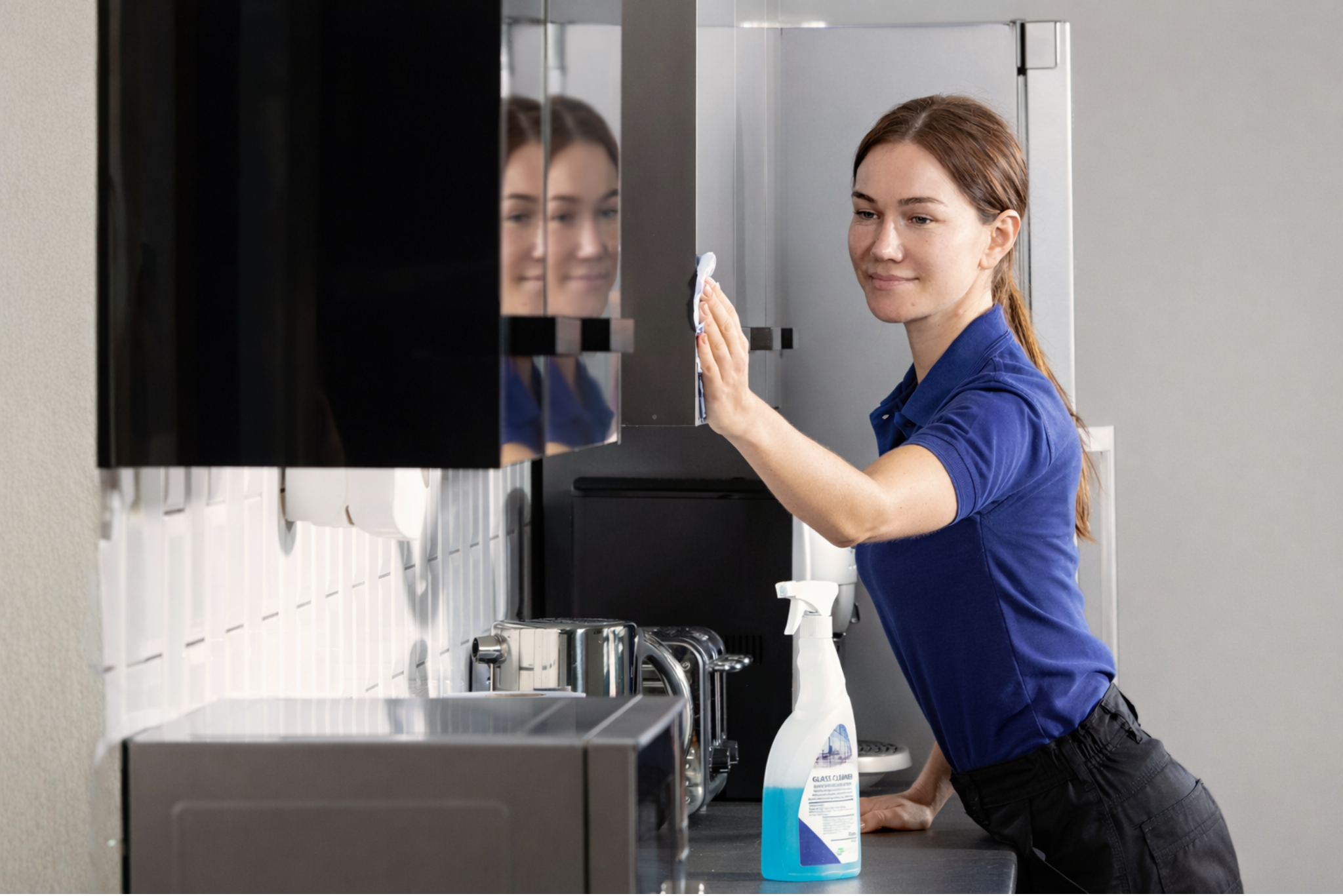 Woman cleaning catalogues
