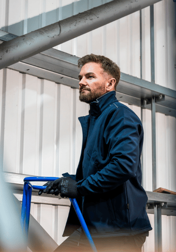 Man in workwear and PPE