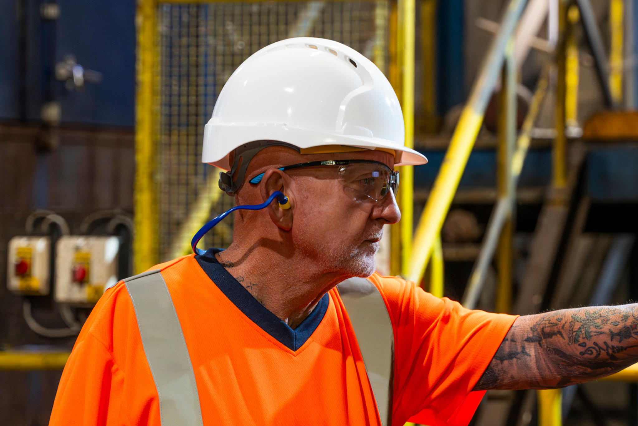 Man wearing workwear.